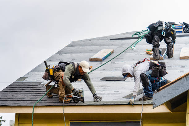 Professional Roofing technician working in Houston, PA